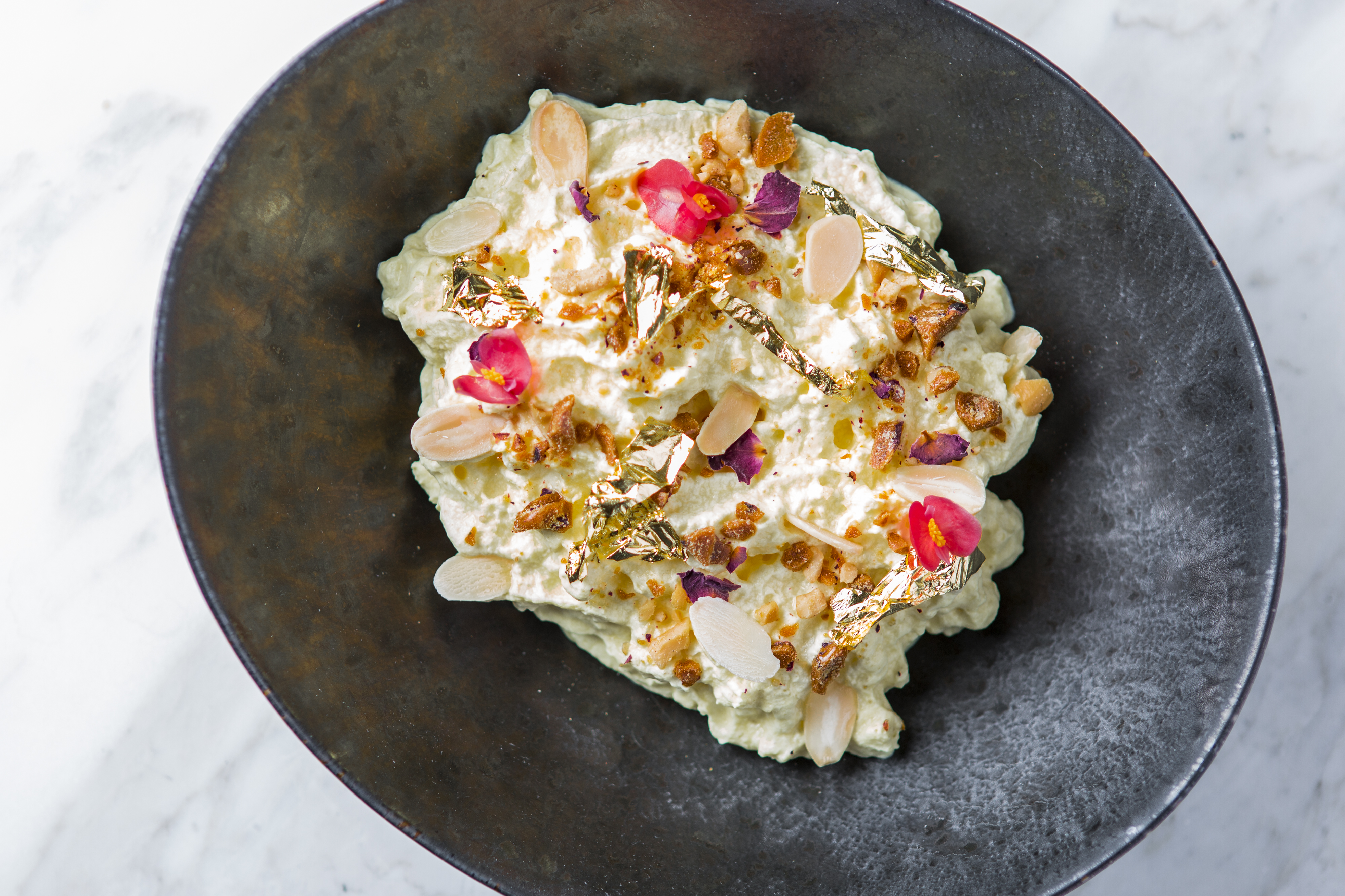 Makhani malai, sadiron milk, rose petal jaggery brittle, almonds pudding