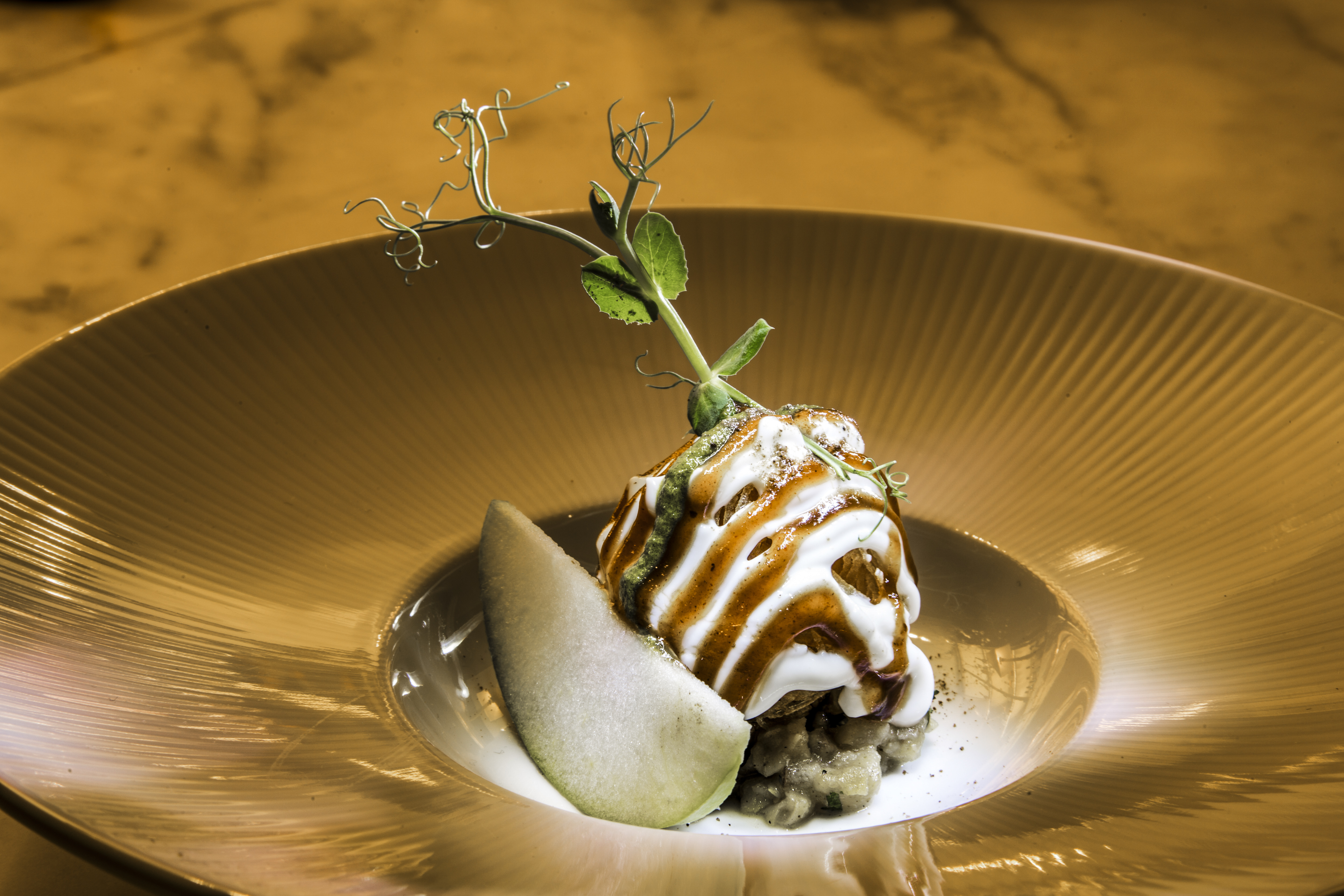 Potato sphere chaat, white pea mash potato