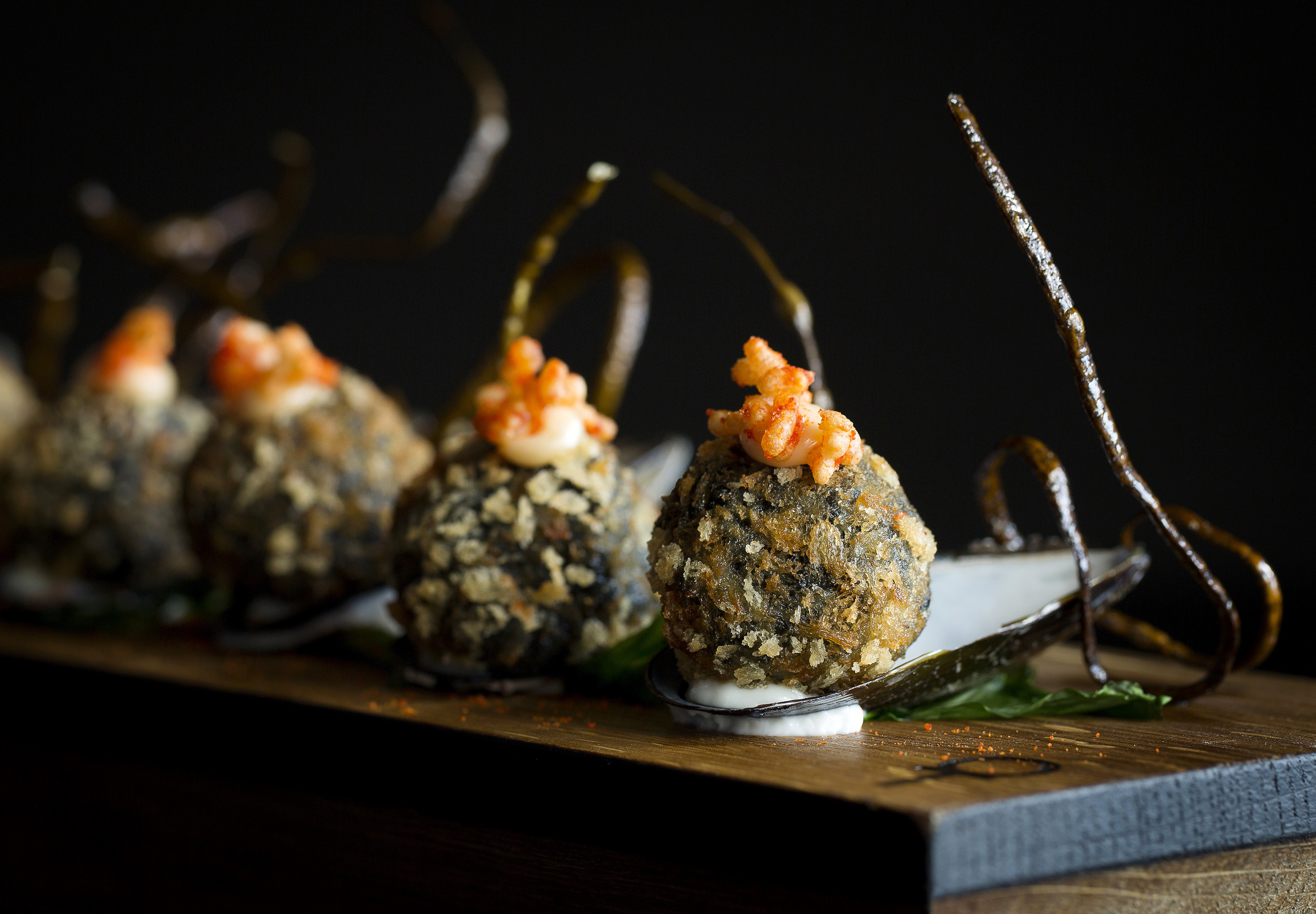 Black seafood ali-oli croquettes