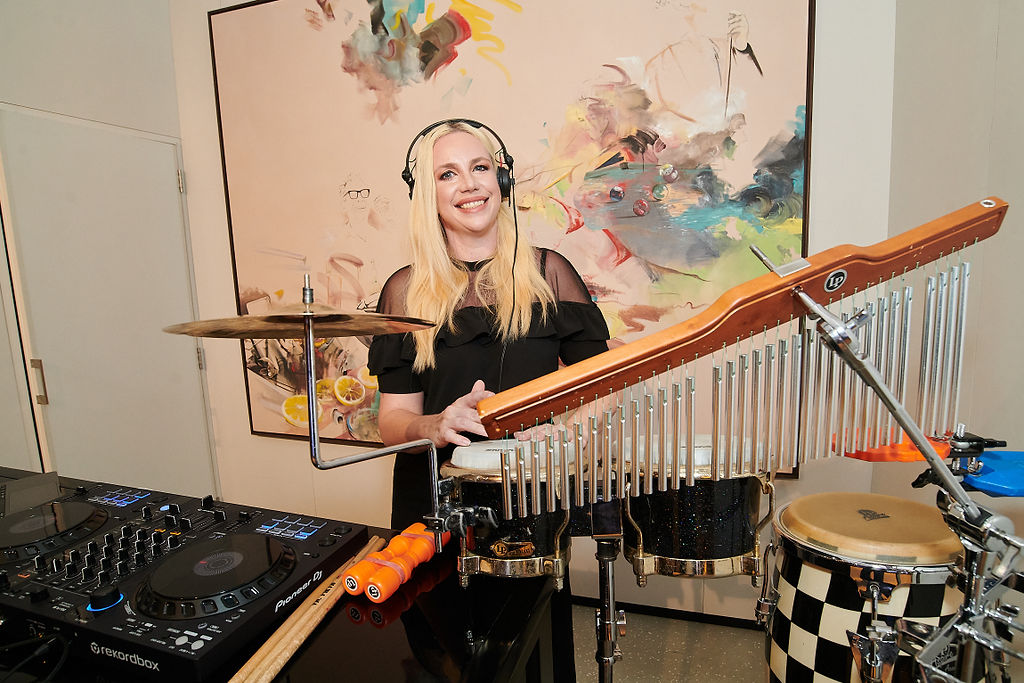 DJ Lyndsey Evans She plays Drums