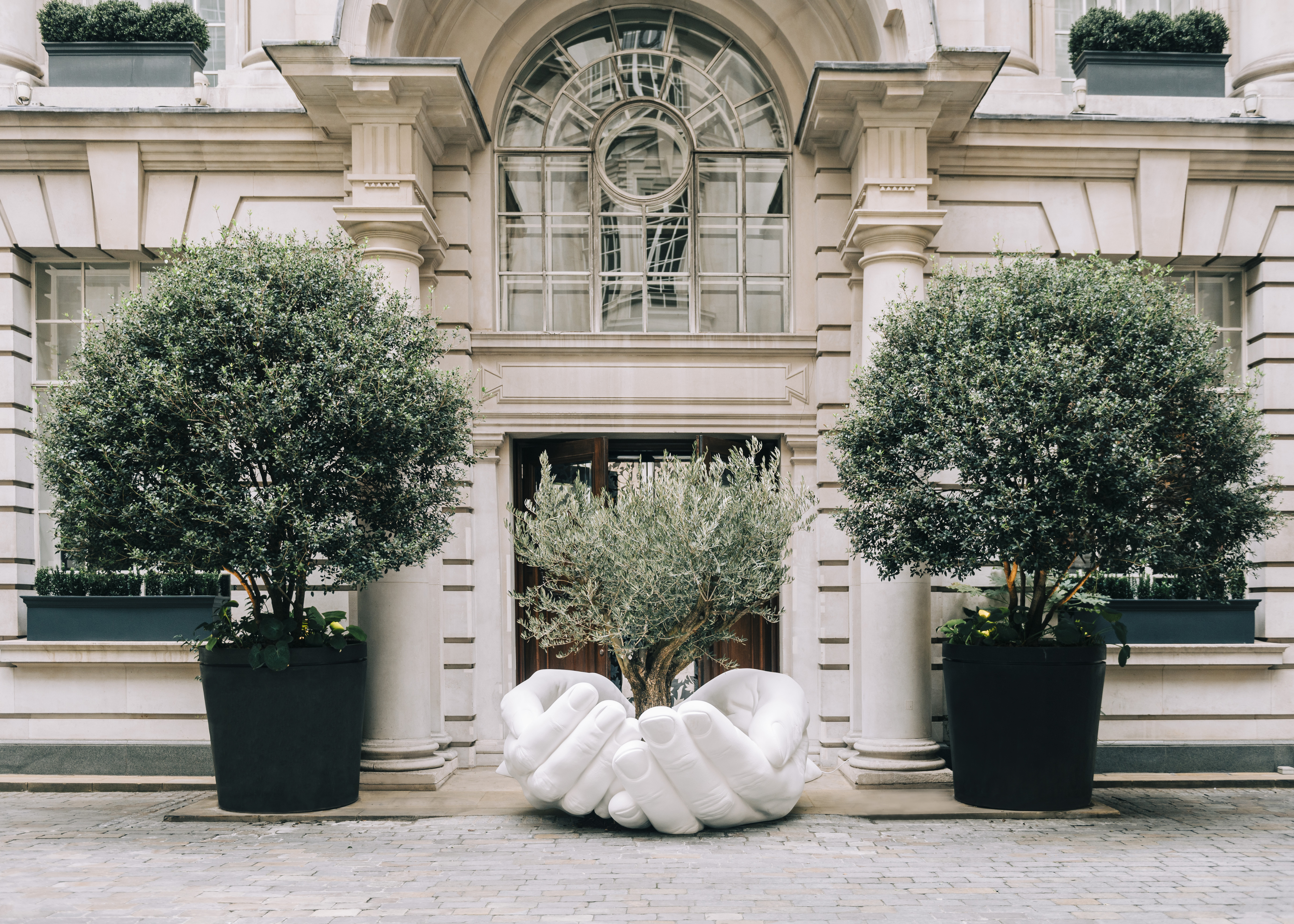 Lorenzo Quinn's 'Give' sculpture at Rosewood London