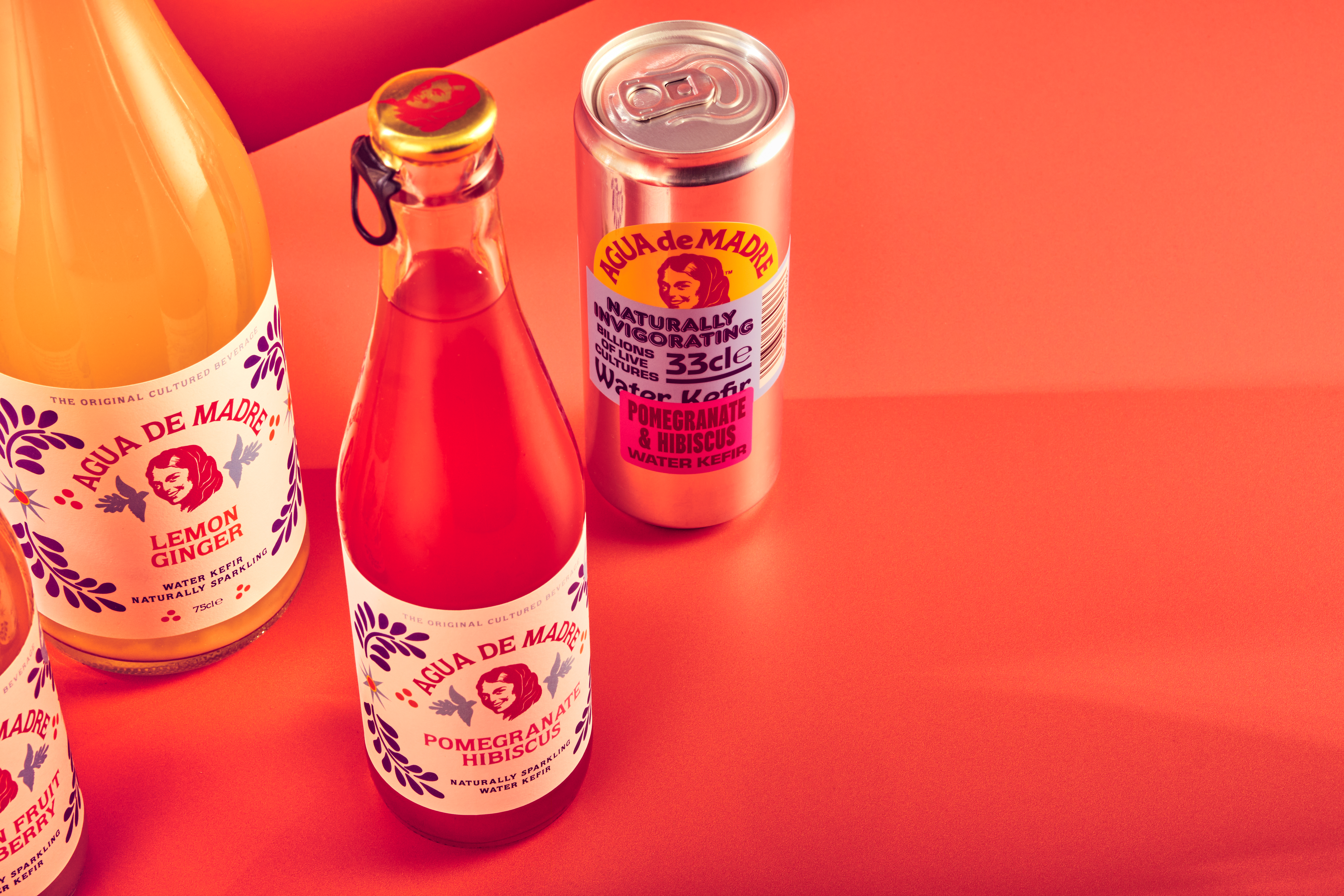 Agua De Madre Water Kefir - glass bottles and cans