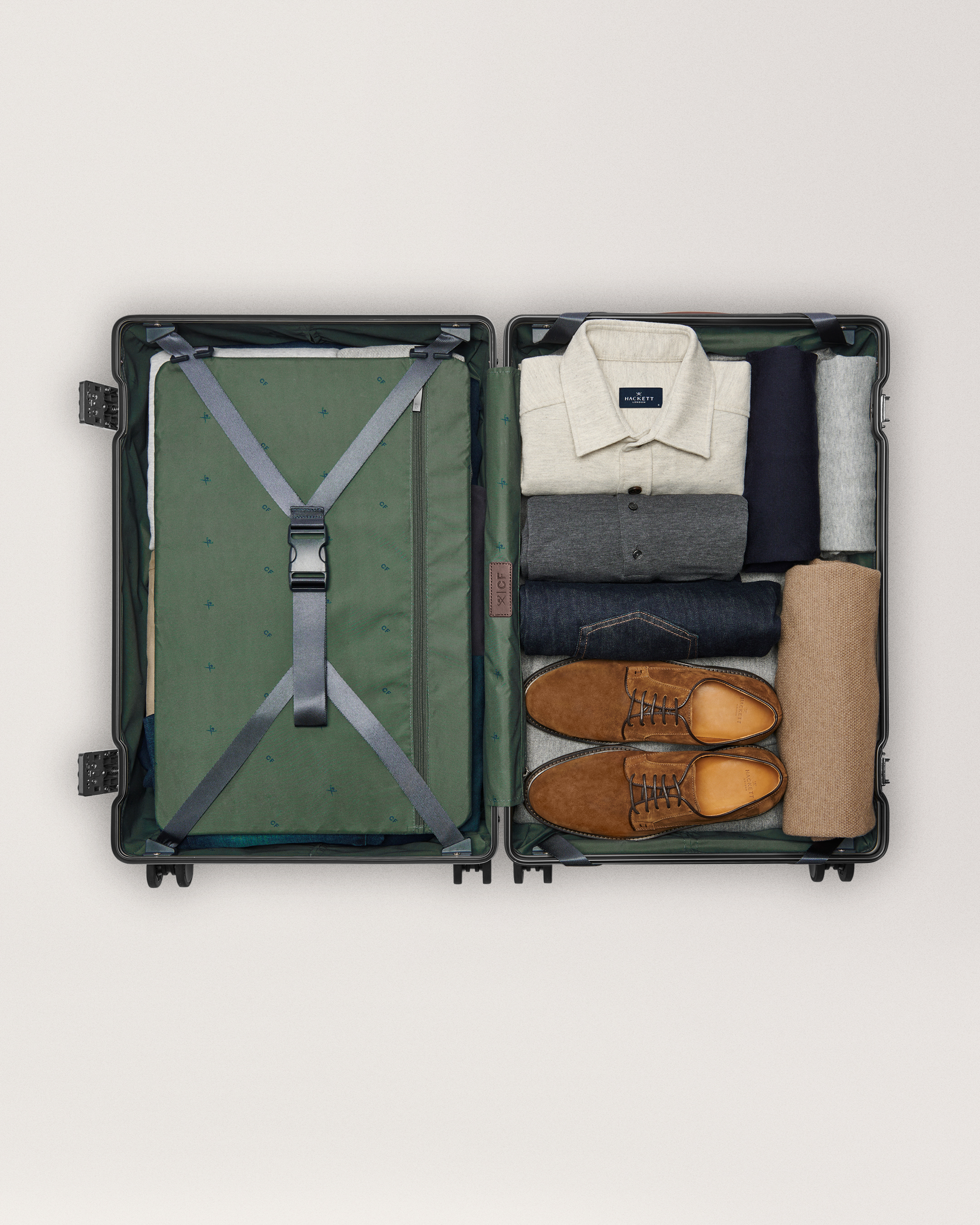 Hackett Luxury Suitcases Carl Friedrik - Hackett London's luxury navy 'Check-In' travel bag with Carl Friedrik with compression pad and straps for seamless packing