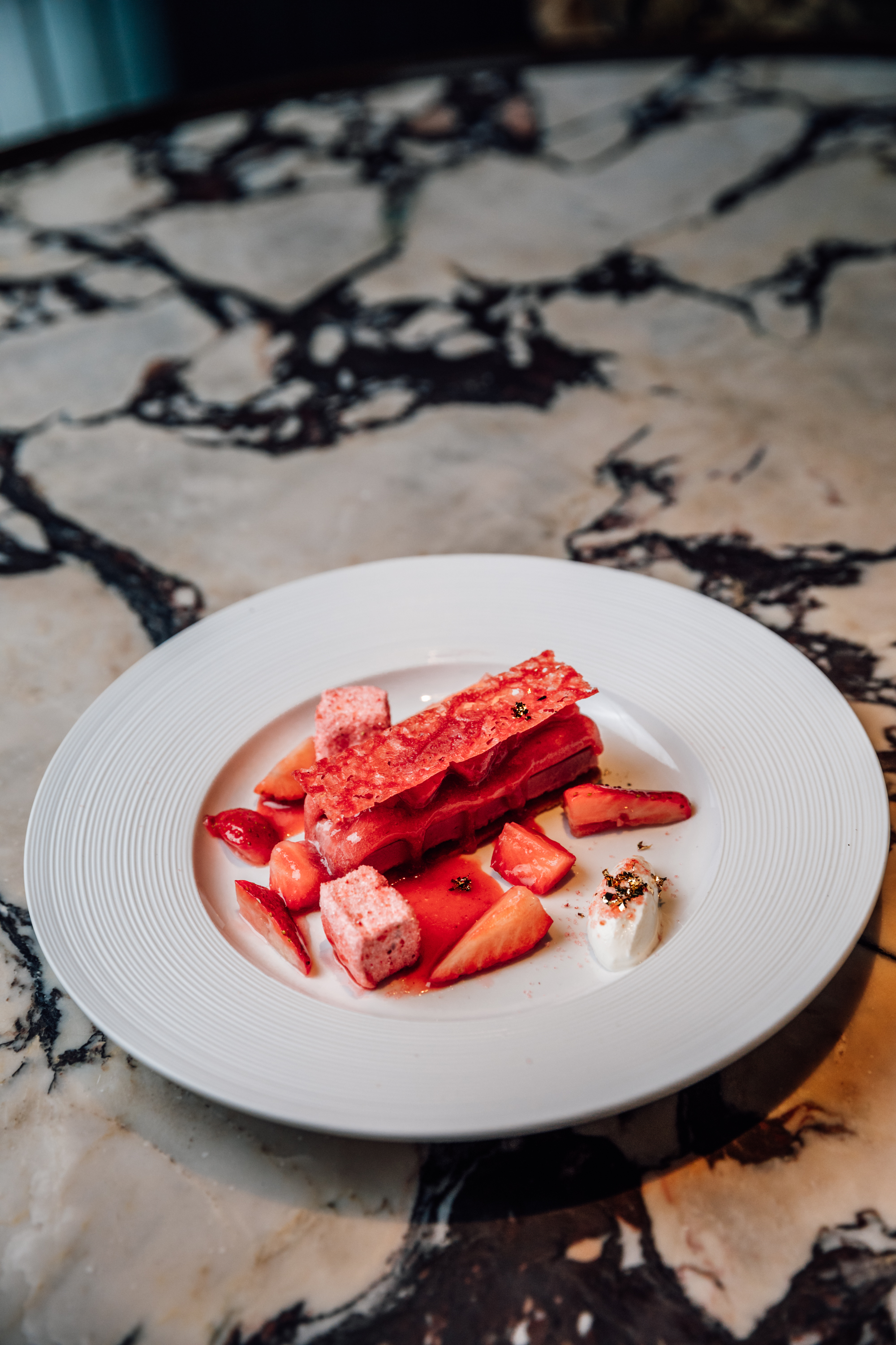 Royal Ascot Restaurants 2025 - a strawberry dessert on a white plate