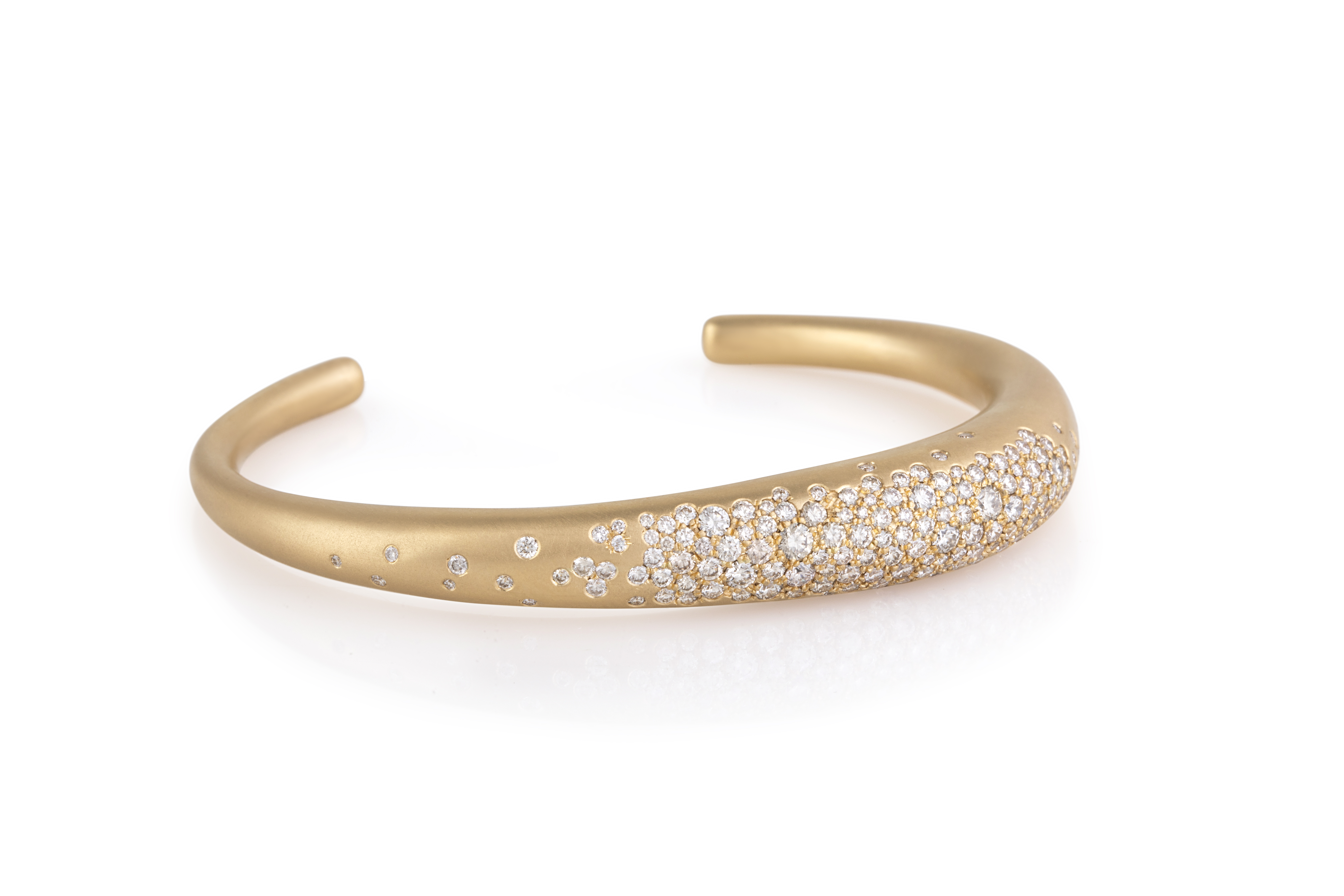 Bracelet Stacks - gold bangle with concentrated patch of diamonds that diffuses out