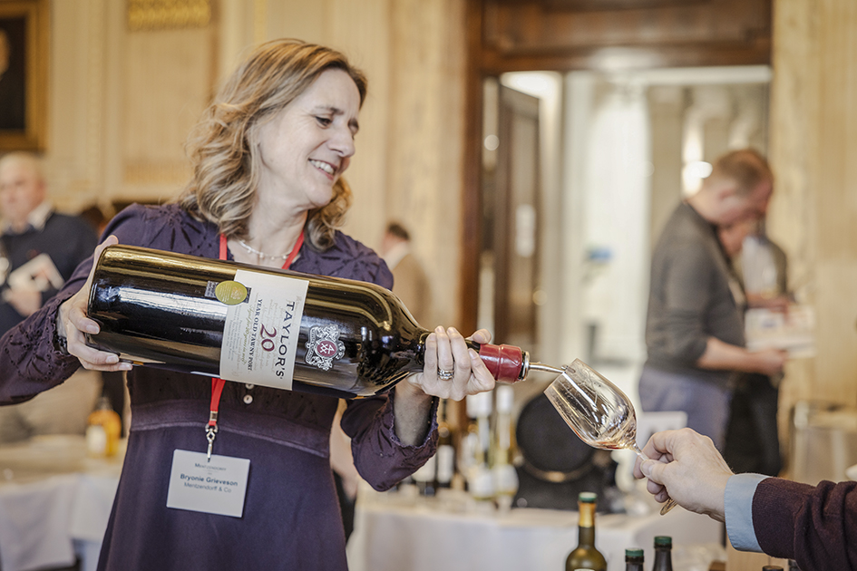 Mentzendorff Annual Tasting - woman pouring a magnum of Taylor's Port in a wine glass