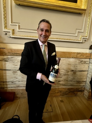 Mentzendorff Annual Tasting - Anthony Hamilton Russell holding a bottle of wine