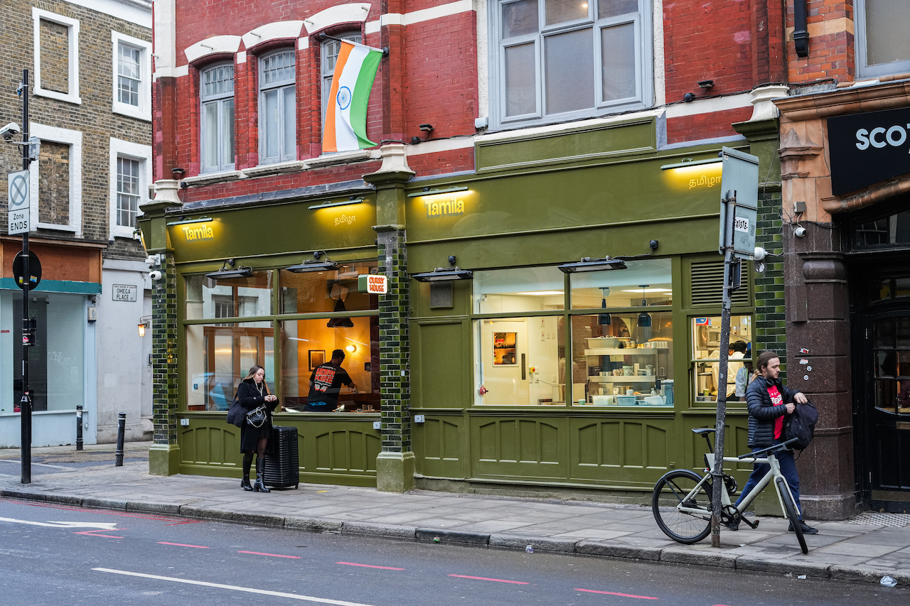 Tamila Restaurant Kings Cross - The exterior of Tamila kings cross, with passers by and a bicycle in front