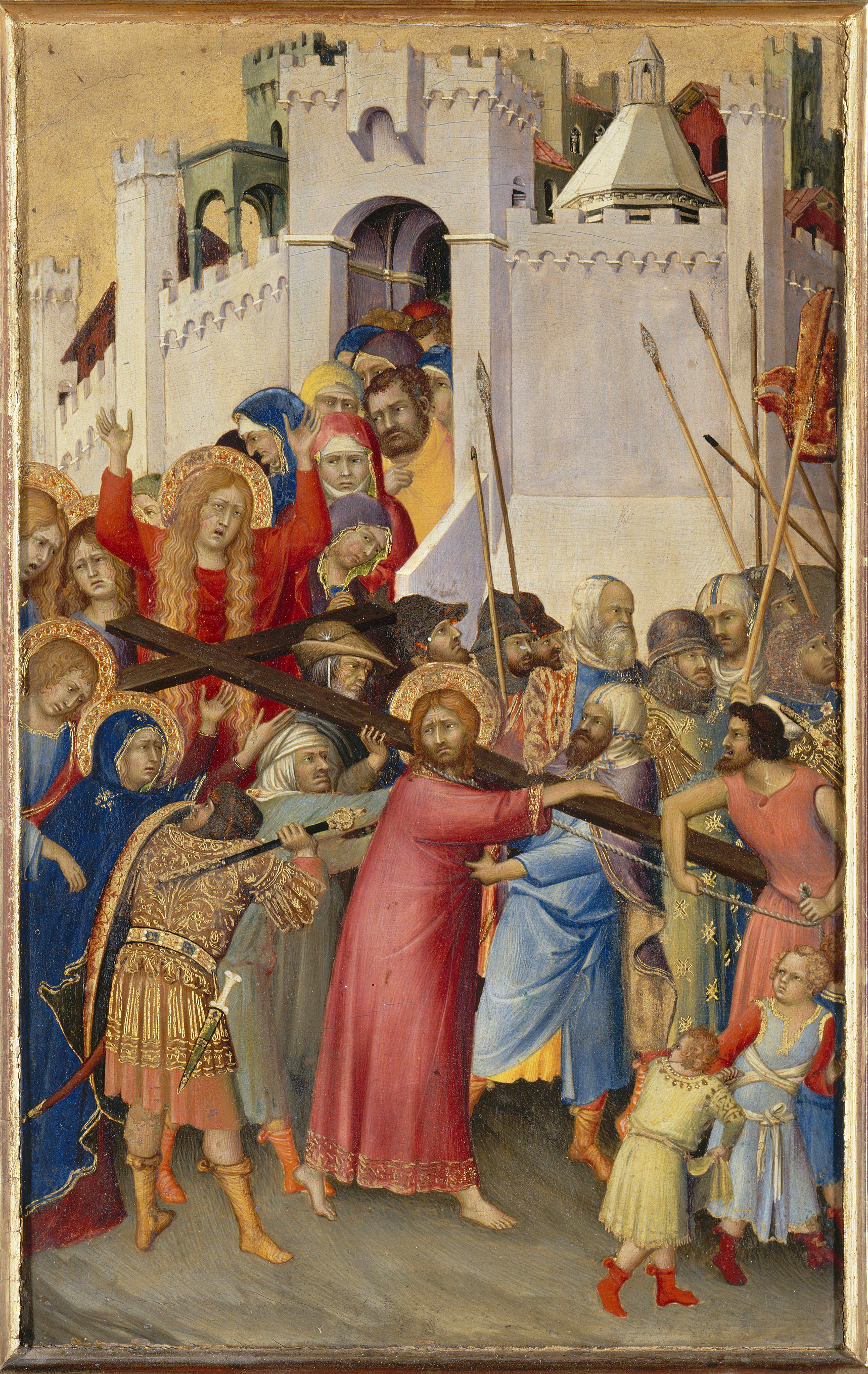 Siena at The National Gallery - The Way to Calvary by Simone Orsini courtesy of The Louvre. This image shows the arrest of Jesus, surrounded by soldiers and a crowd as he holds a cross.