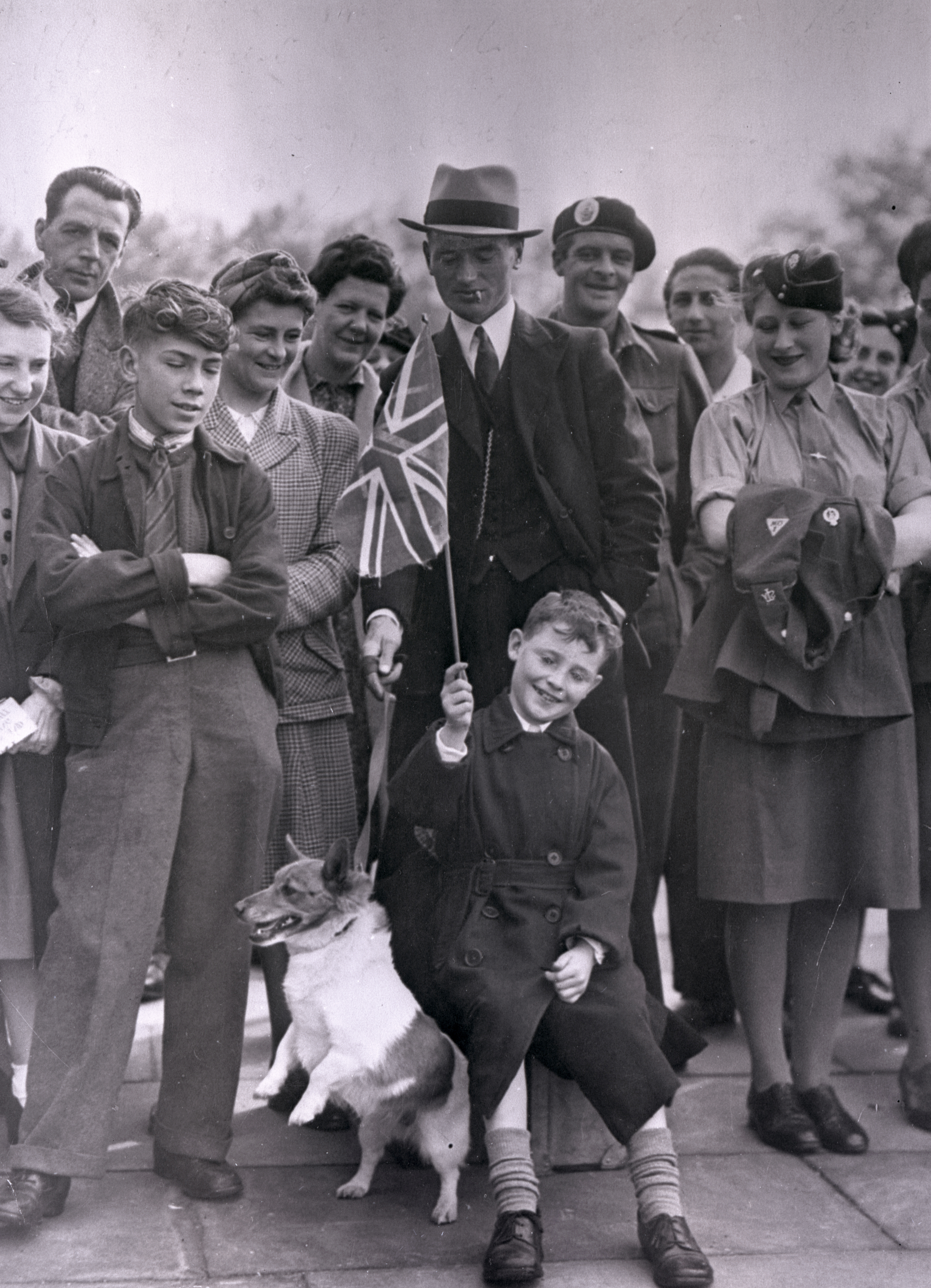 A group of people celebrating VE Day in 1945, now celebrating its 80th anniversary.