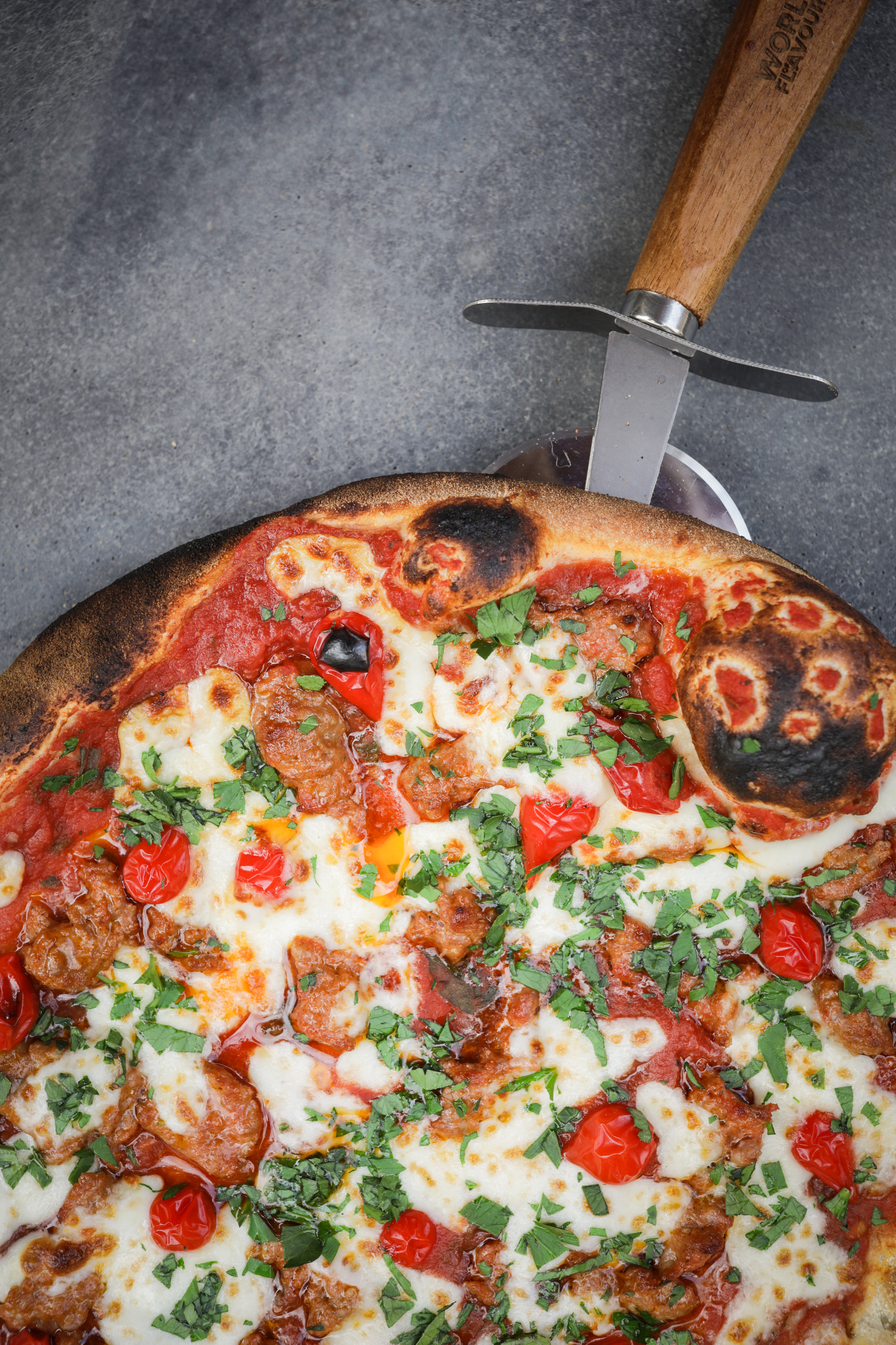 A pizza at The Aviary that you can win at The Feathers Woodstock.