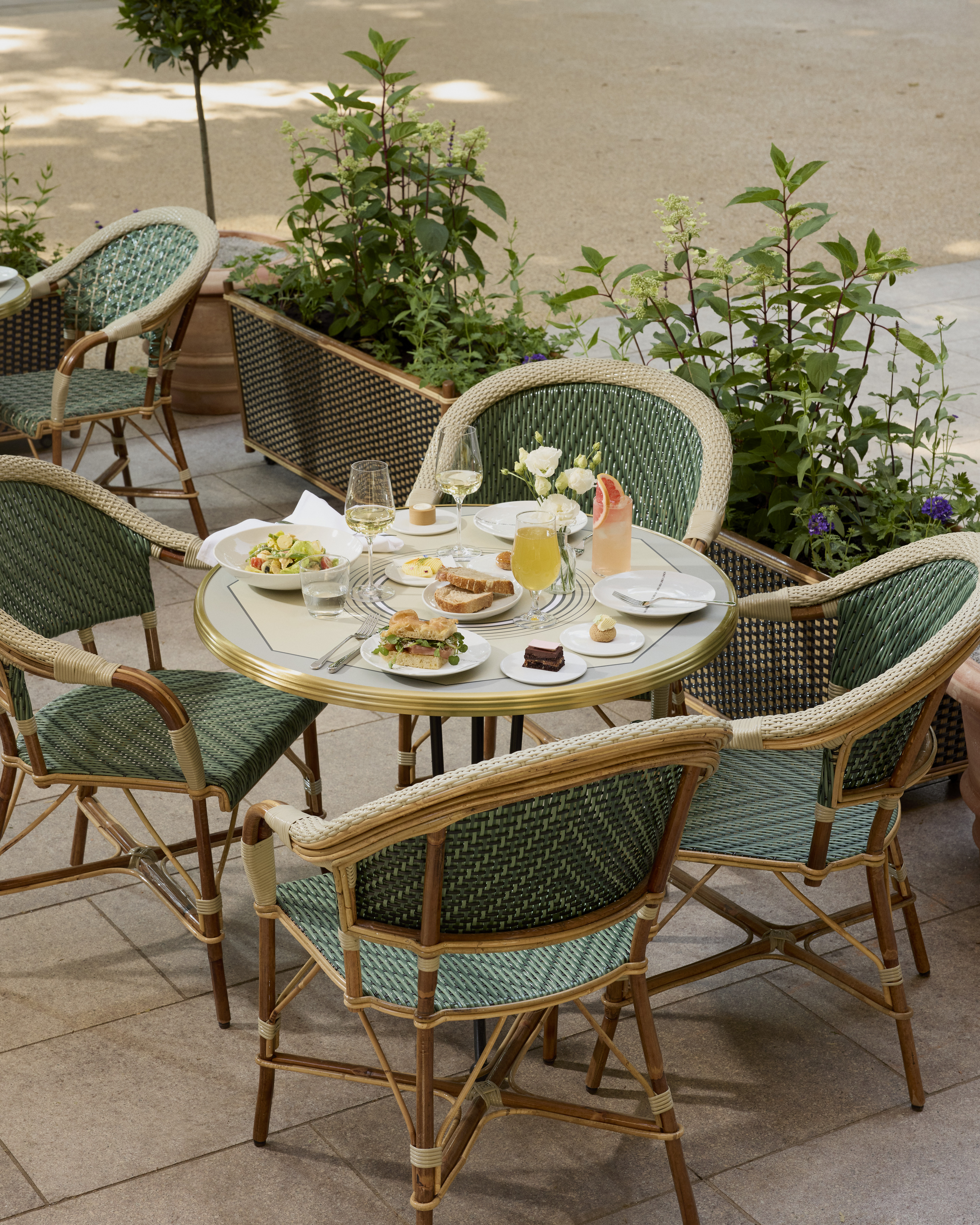Outdoor chairs and lunch at Cafe Linea.