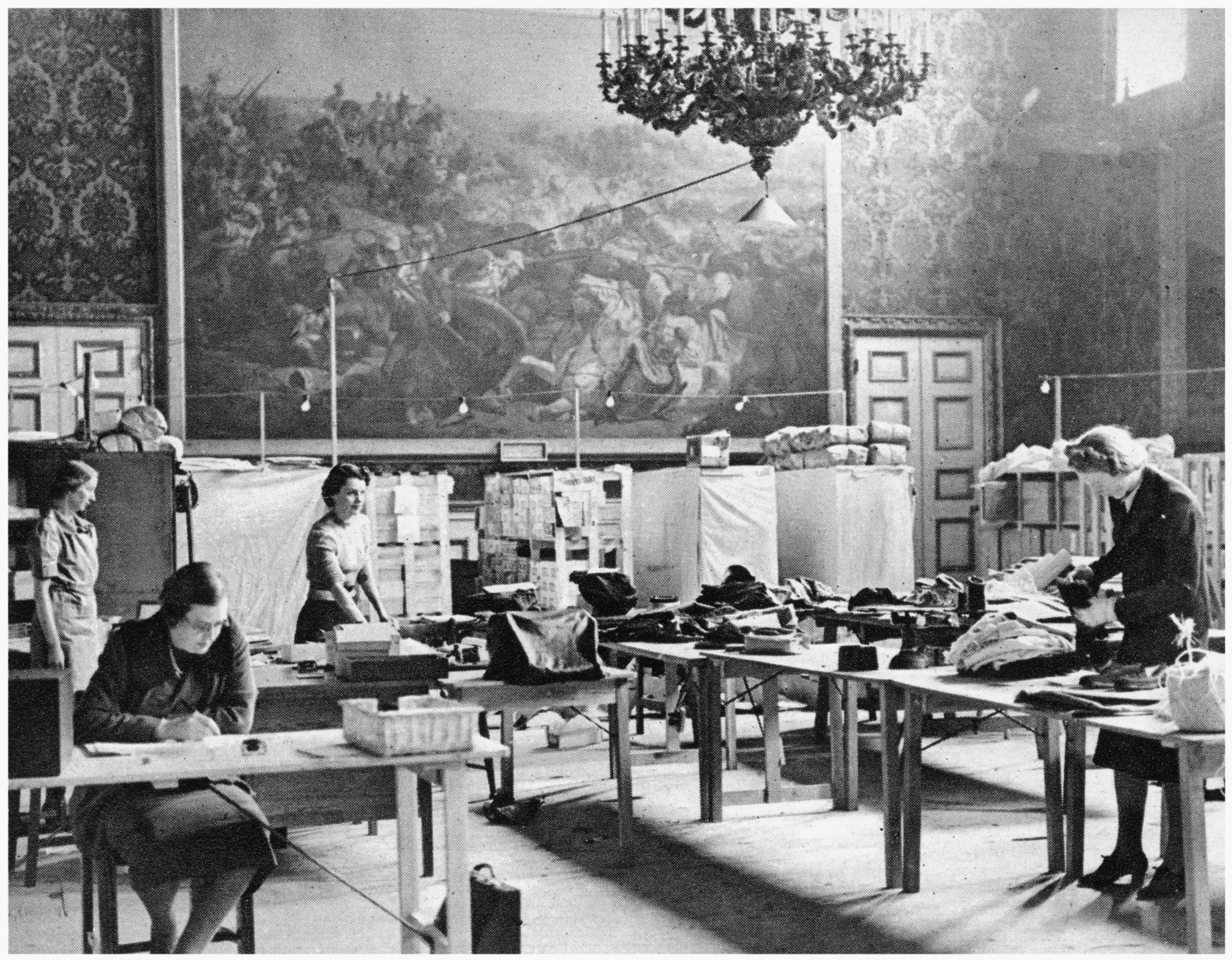 The Banqueting Room being used to make care packages, in St James's Palace.