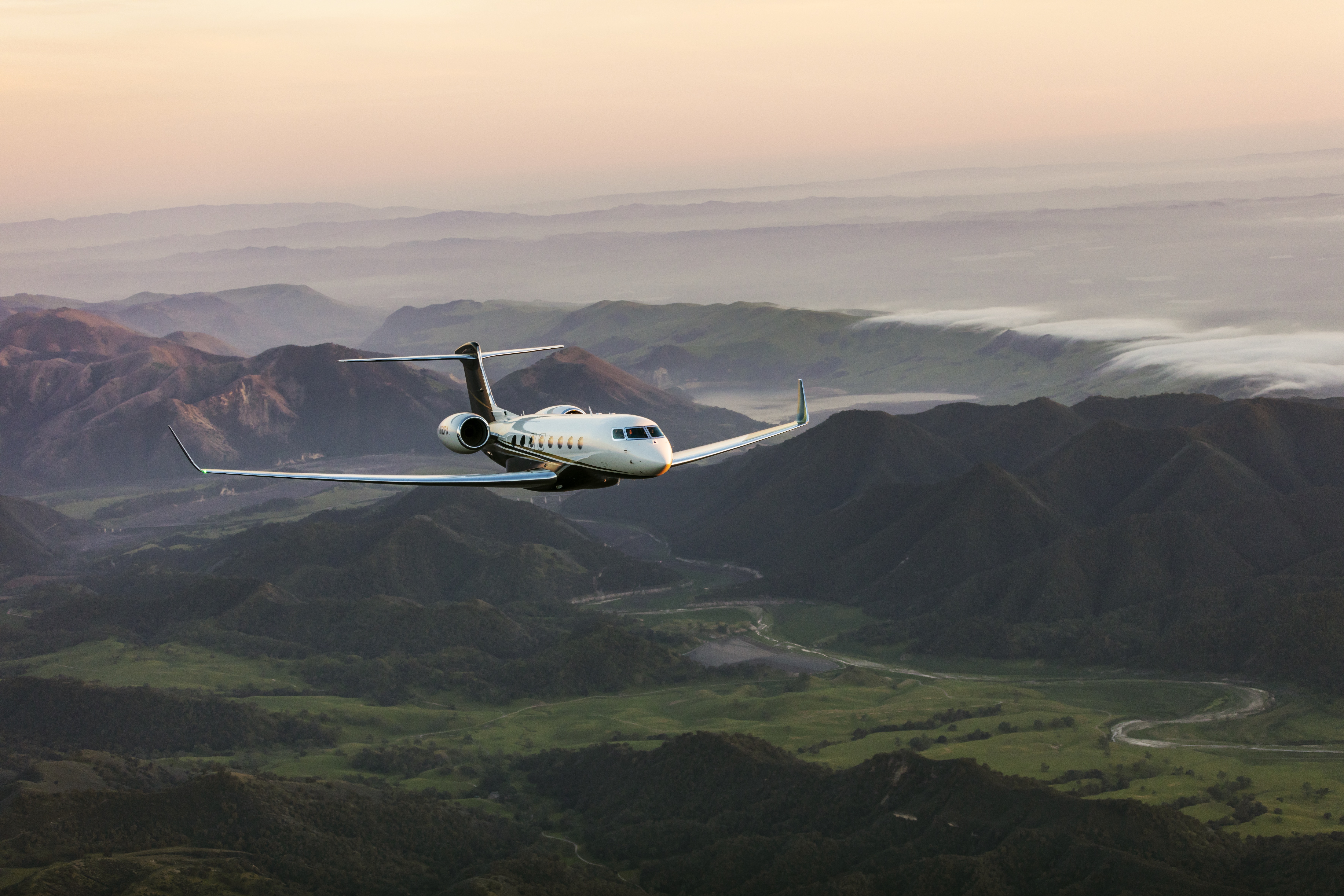 Riva Flexjet Flying Over Mountains