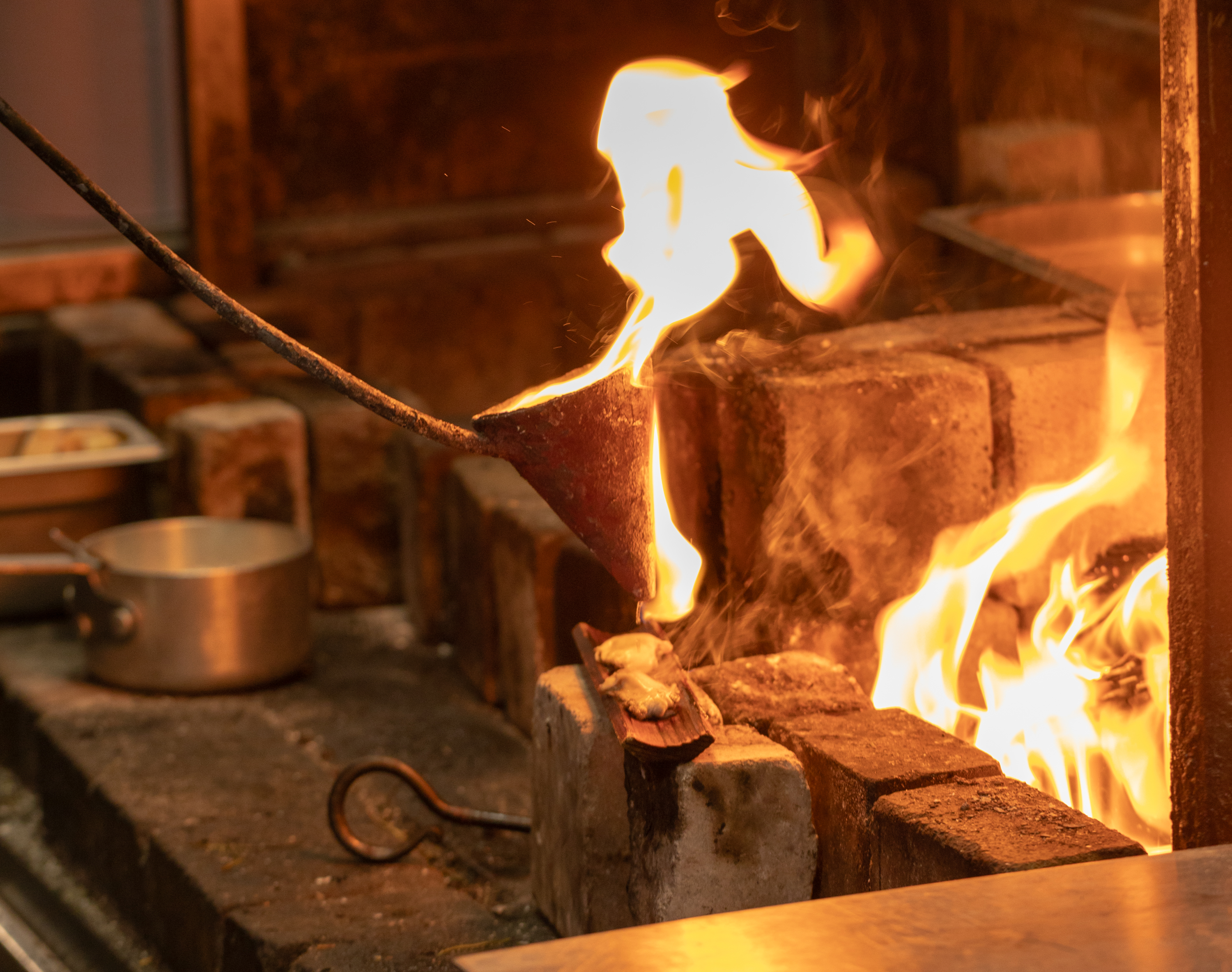 A Flambadou oyster prepared over open flame at Ekstedt,