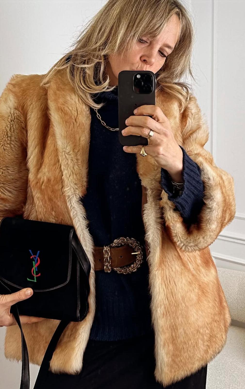 Bay Garnett in fur jacket and YSL bag. 