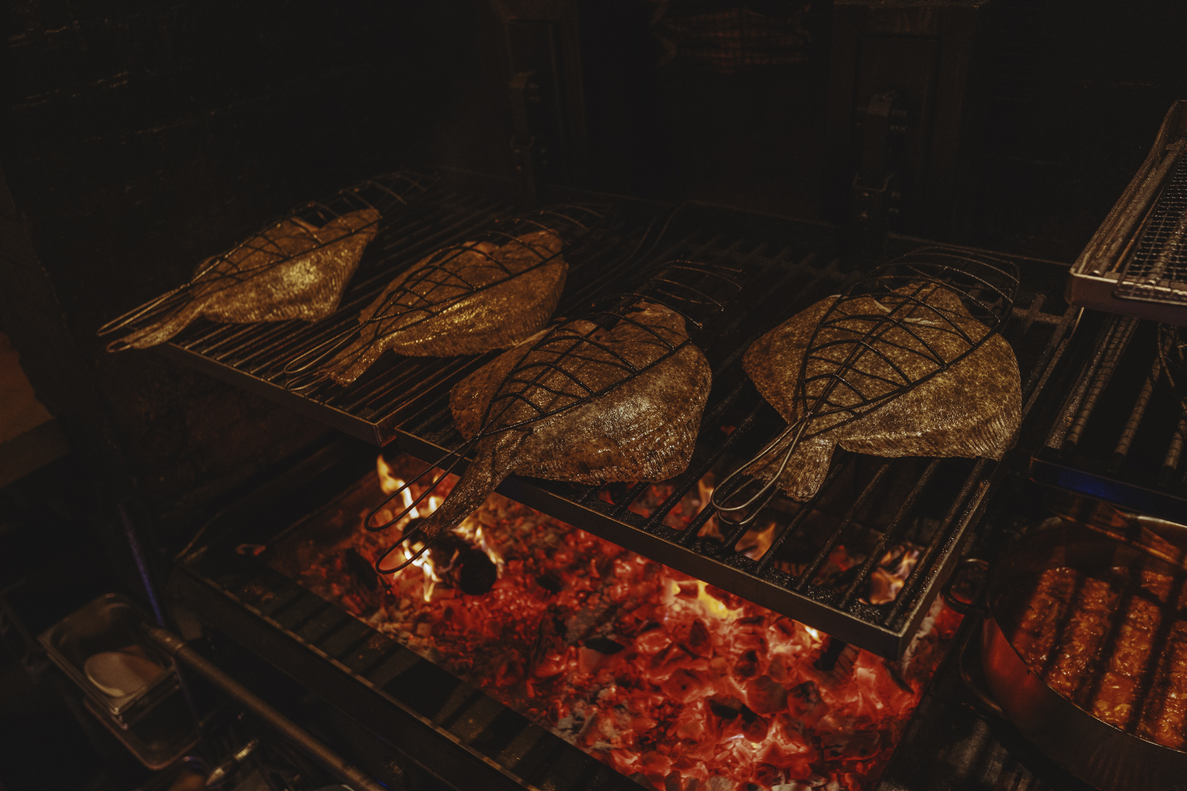 Brat's John Dory cooked on open-fire, restaurants to check out this bonfire night.