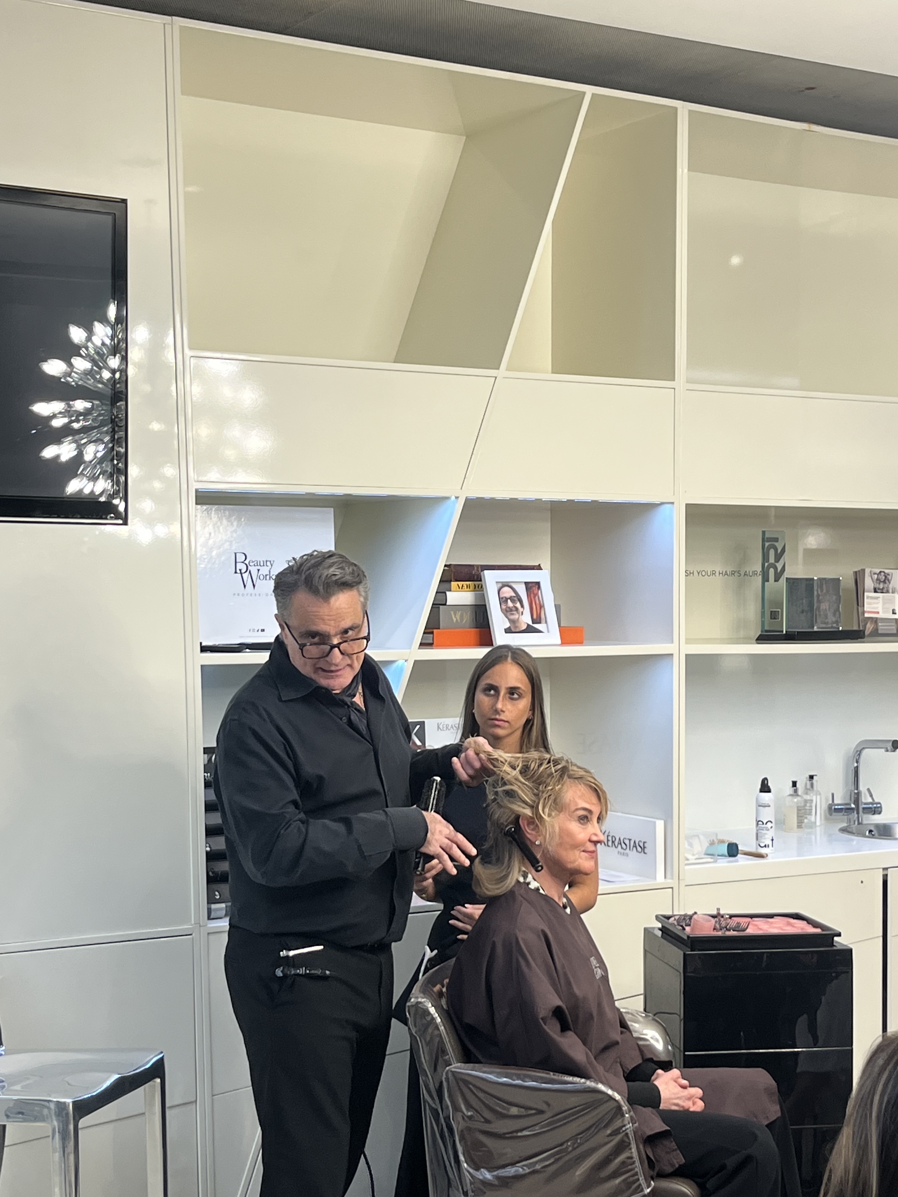 Red Carpet Hair Daniel Galvin - Lino rolling Anthea's hair.