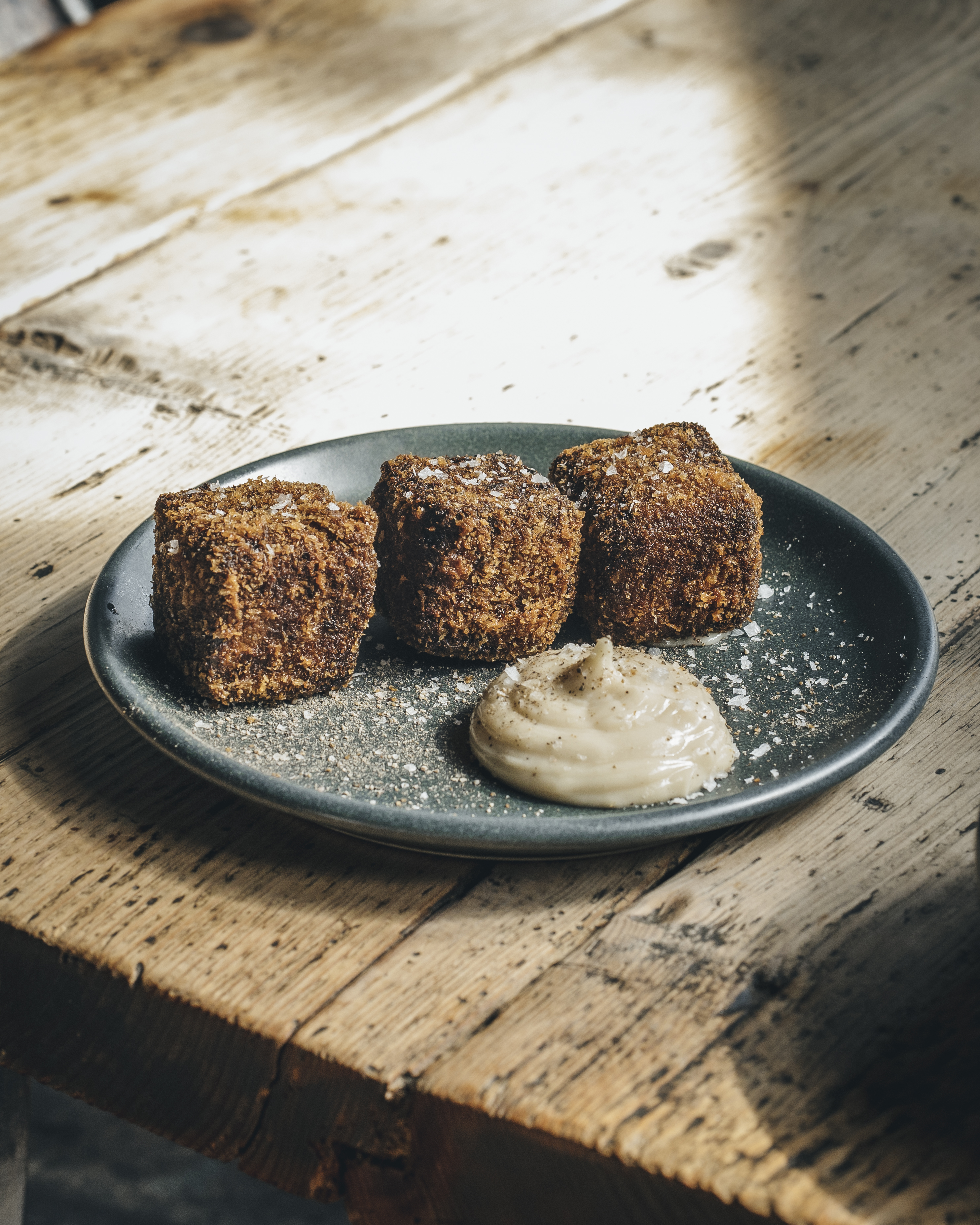 The Crispy Ox Cheek cooked on an open-fire at Smokestak restaurant.