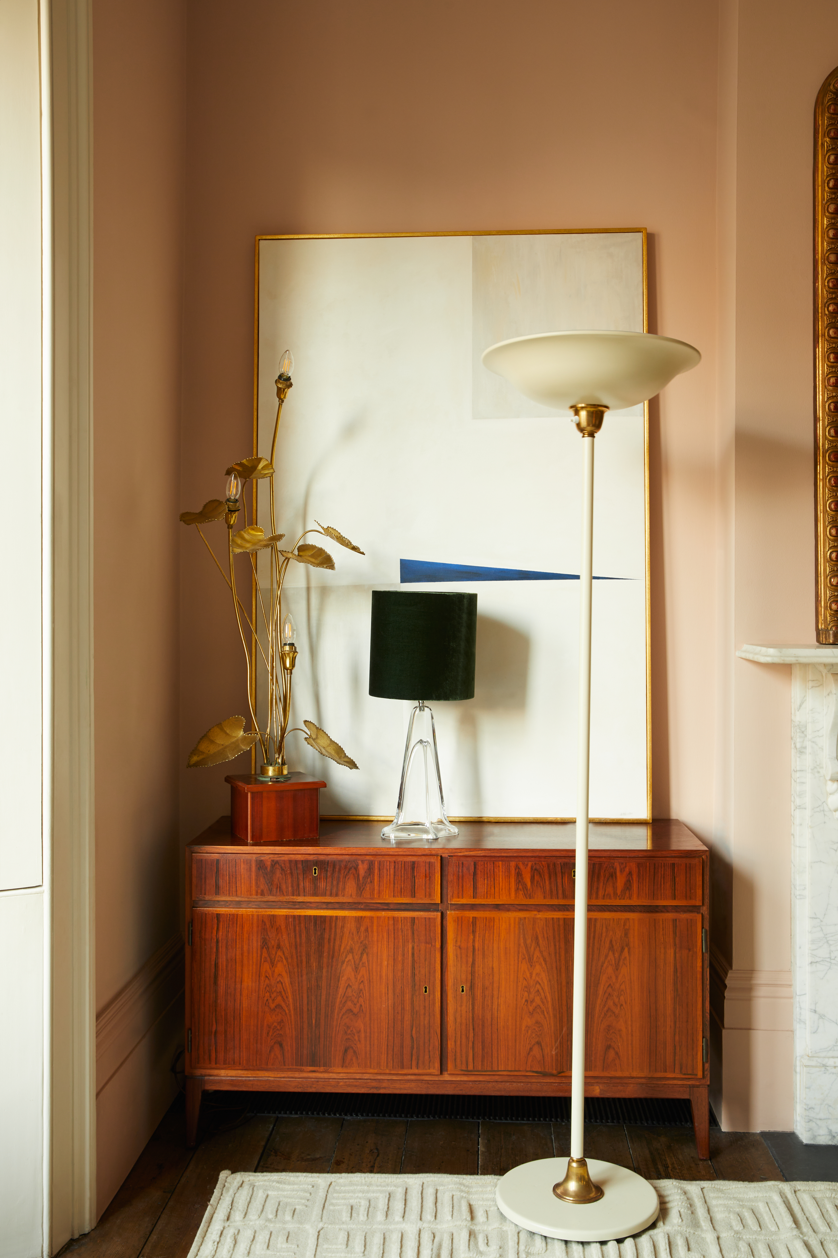 Vinterior Sandrine Ferron Zhang standing lamp, painting, and cabinet.