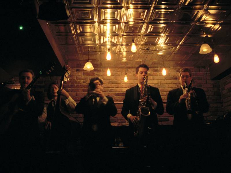 Five piece band performing at London jazz club, Nightjar.