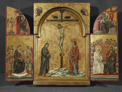 Siena at The National Gallery - Triptych with the Crucifixion, Saint Nicholas, Saint Clement and the Redeemer with Angels by Duccio. This is a triptych depicting the crucifixion of Jesus in the centre. The side panels show scenes of the Annunciation and a group of angels.