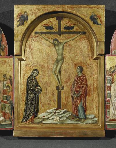 Siena at The National Gallery - Triptych with the Crucifixion, Saint Nicholas, Saint Clement and the Redeemer with Angels by Duccio. This is a triptych depicting the crucifixion of Jesus in the centre. The side panels show scenes of the Annunciation and a group of angels.